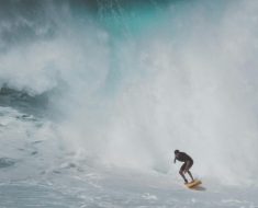 man surfing on sea waves